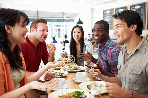 active earbuds for hearing boost in crowded restaurant