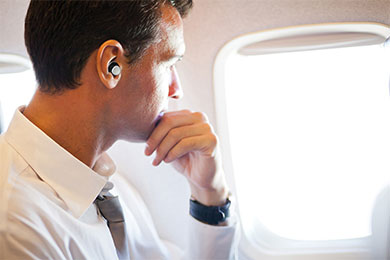 noise cancelling earbuds on airplane